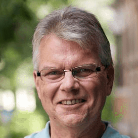 headshot of Dennis Carlone in city hall; crop from city council's photo